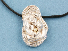 Sterling silver fossil pendant